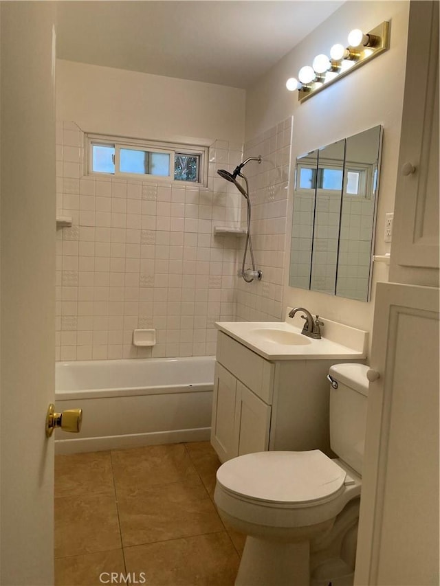 full bath featuring toilet, tile patterned flooring, vanity, and shower / bathing tub combination