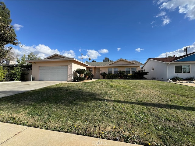 single story home featuring a garage, a front yard, driveway, and stucco siding