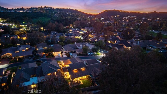 aerial view at dusk with a residential view