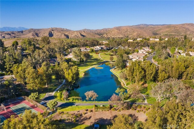 bird's eye view featuring a water and mountain view