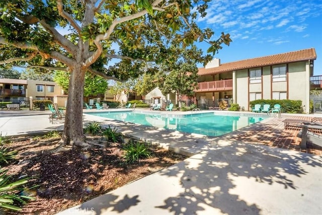 pool with a patio