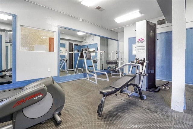 workout area featuring visible vents