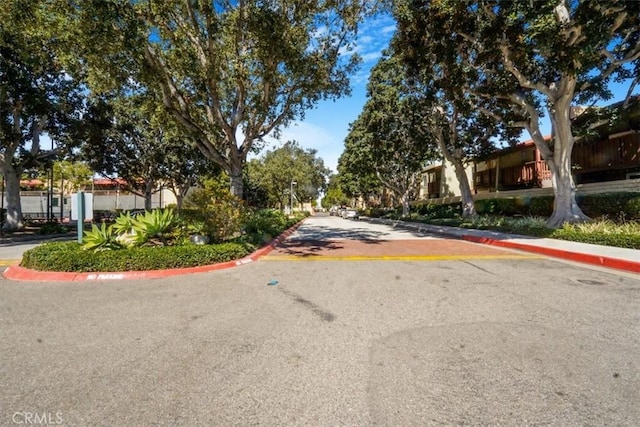 view of street featuring sidewalks and curbs