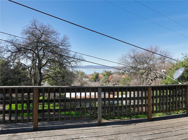 deck featuring a water view