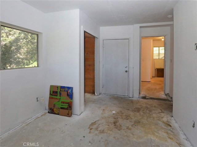 interior space featuring concrete flooring