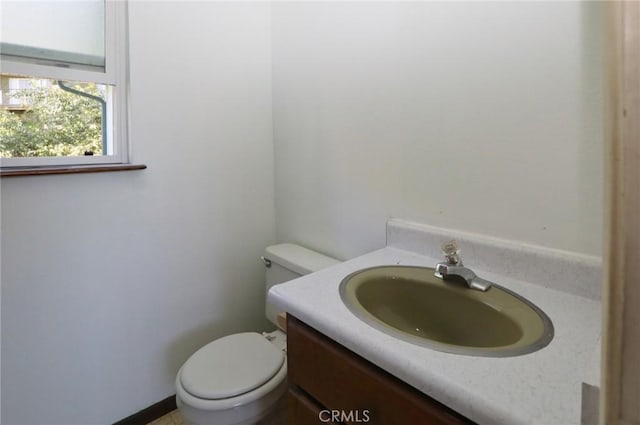 half bath with toilet and vanity