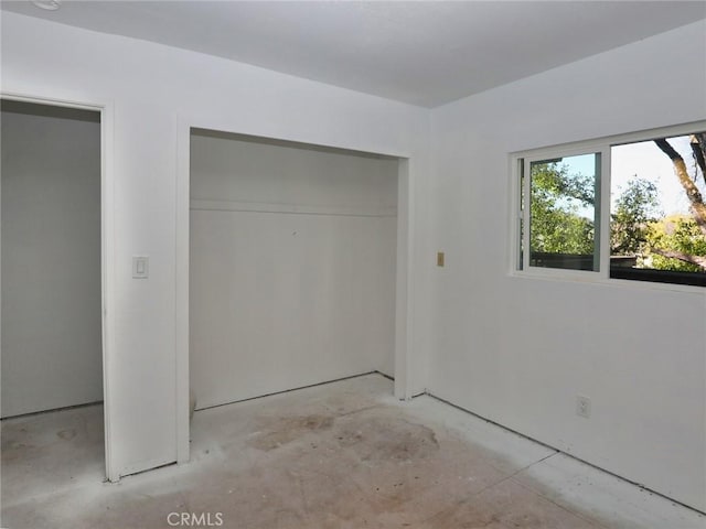 4165 Dawes Ave, Nice, CA 95464 - unfurnished bedroom with a closet and concrete floors
