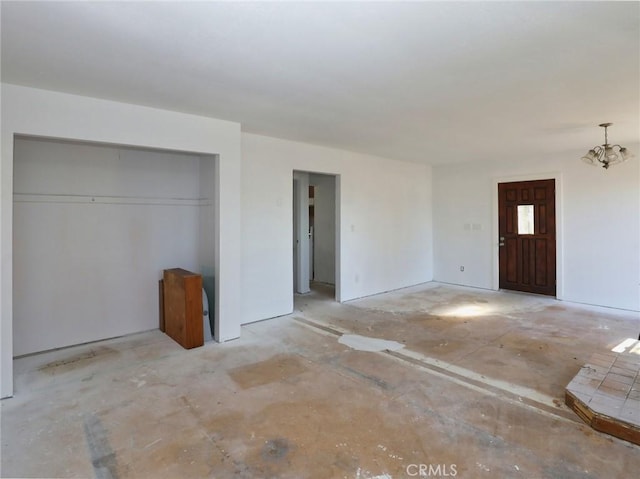 interior space with a chandelier