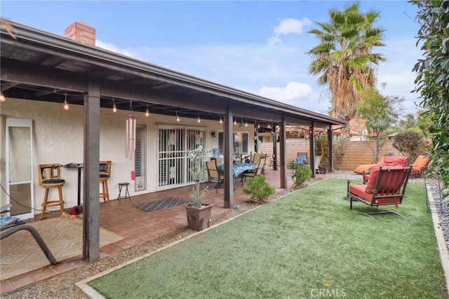 view of patio / terrace with fence