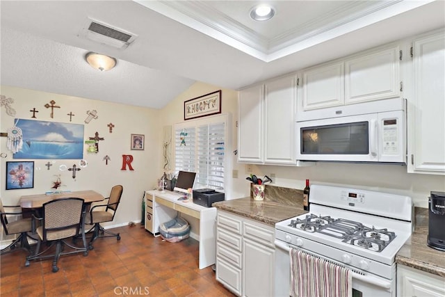 kitchen with crown molding, white appliances, visible vents, and white cabinetry