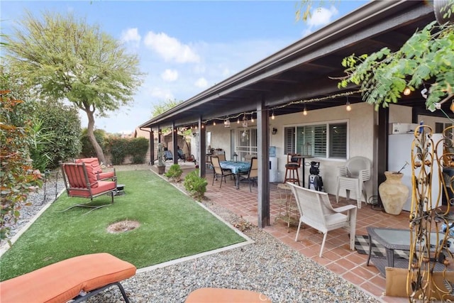 view of patio / terrace featuring fence