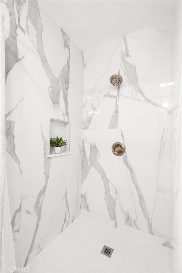 details with a marble finish shower