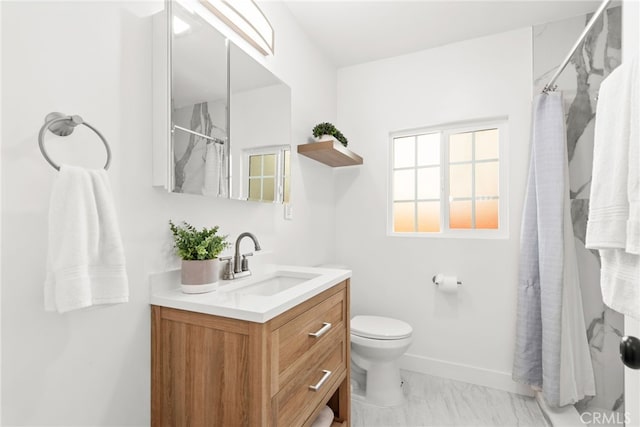 full bath with marble finish floor, toilet, vanity, a shower with curtain, and baseboards