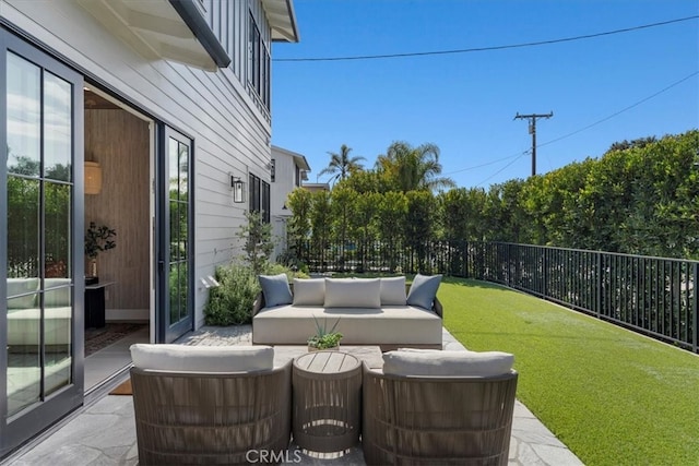 view of patio / terrace with outdoor lounge area and a fenced backyard