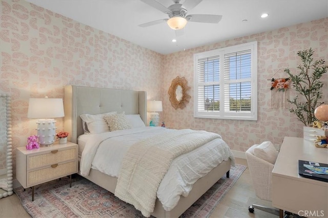 bedroom with recessed lighting, baseboards, a ceiling fan, and wallpapered walls