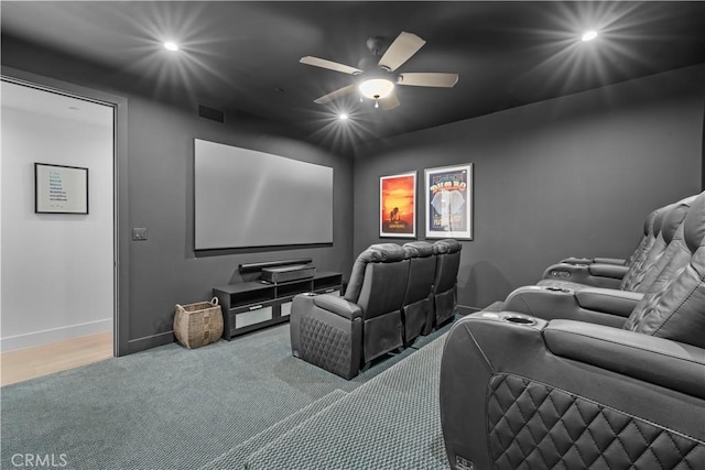 carpeted cinema room featuring visible vents, recessed lighting, a ceiling fan, and baseboards