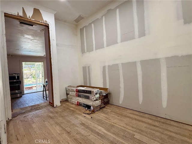 interior space featuring visible vents and wood finished floors