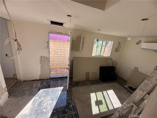 bathroom featuring granite finish floor and visible vents