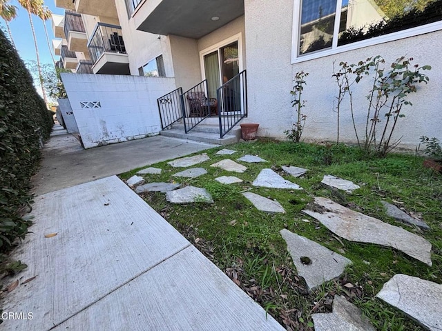 view of yard featuring a patio and fence