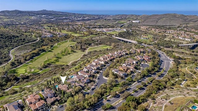 bird's eye view featuring a water view and a residential view