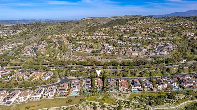 aerial view with a mountain view and a residential view