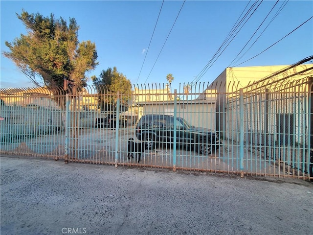 view of gate featuring fence