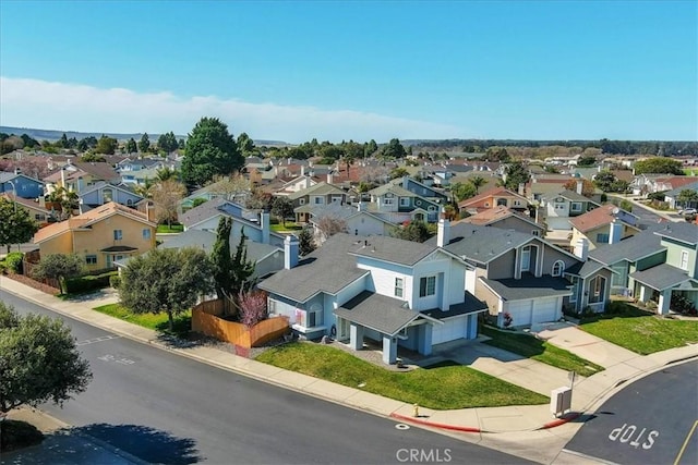 drone / aerial view with a residential view