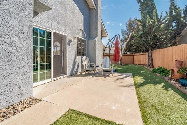 view of patio / terrace featuring a fenced backyard