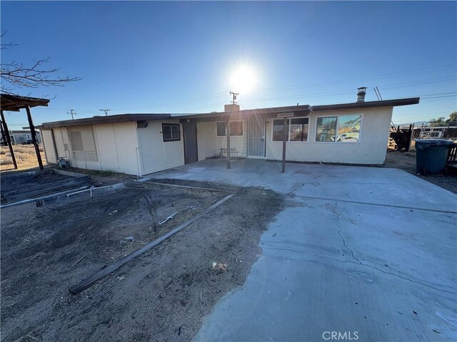 13063 Gilbert St, Edwards, CA 93523 - rear view of house with a patio area