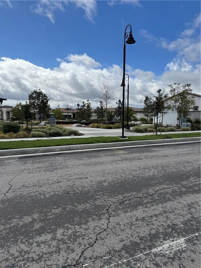 view of street with street lighting and sidewalks