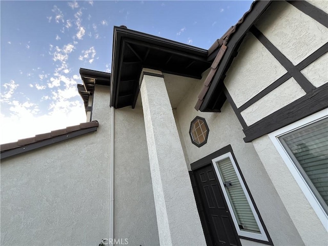 details featuring stucco siding