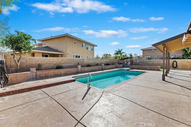 view of pool with a patio area, a fenced backyard, and a fenced in pool