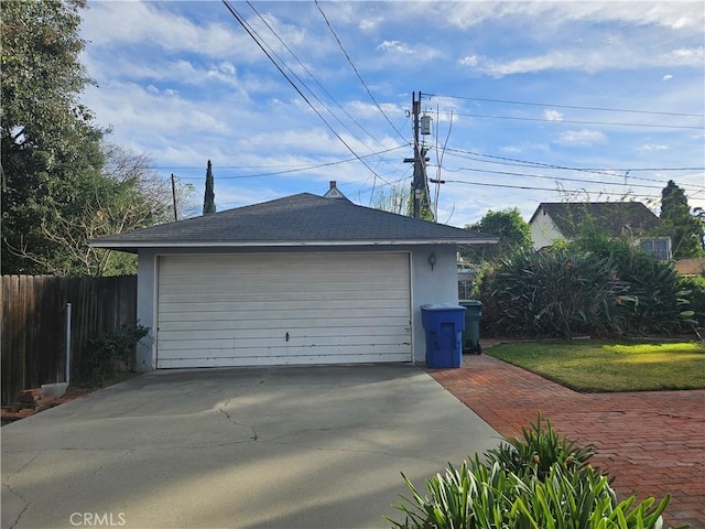 detached garage with fence