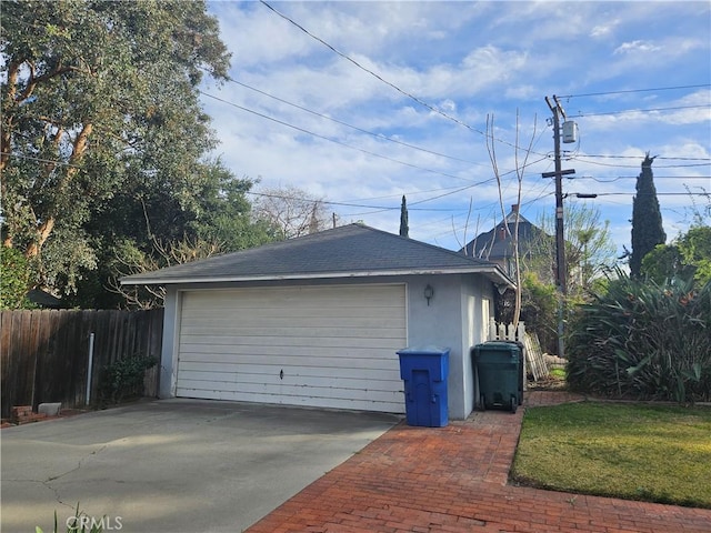 detached garage with fence