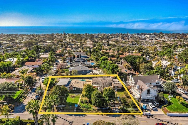 bird's eye view with a residential view and a water view