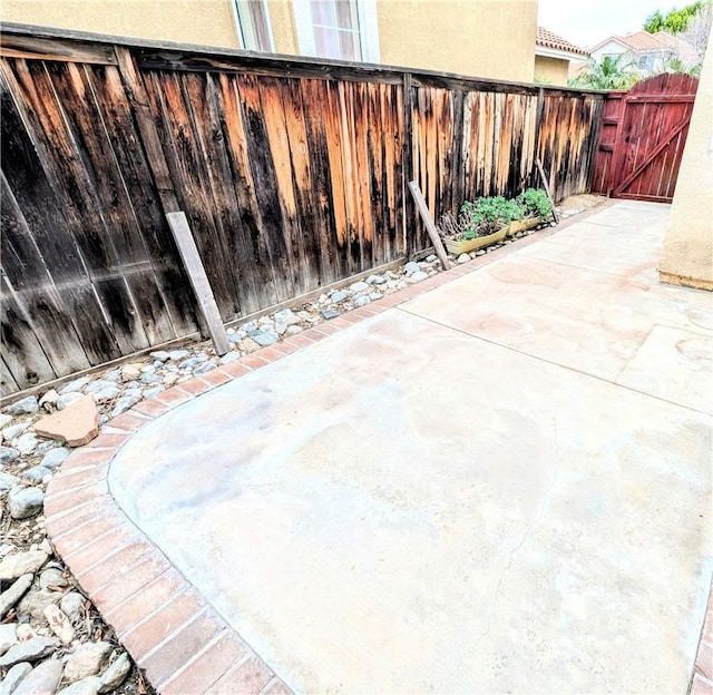 view of patio / terrace with fence