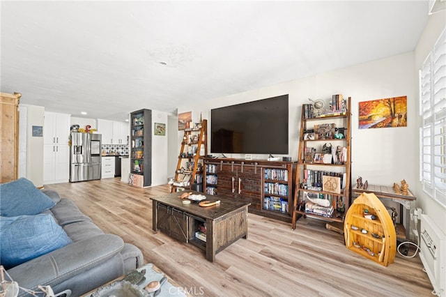 living area with light wood finished floors