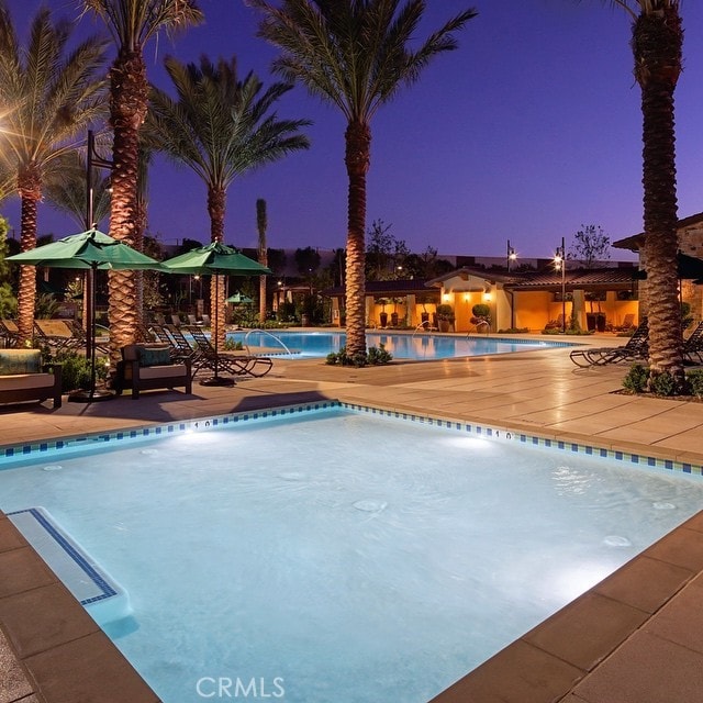 community pool featuring a patio