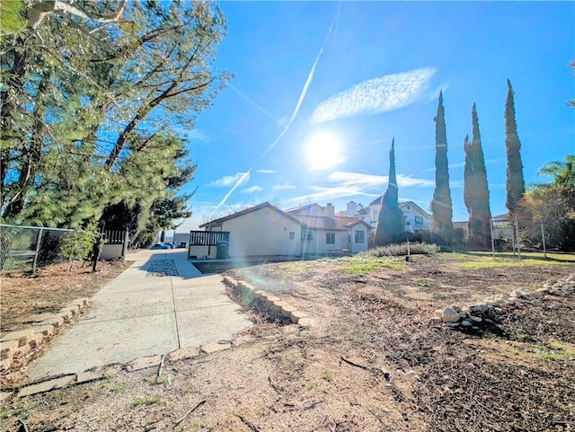 view of front of house with fence