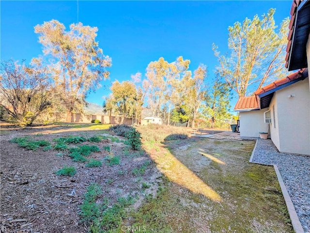 view of yard featuring fence