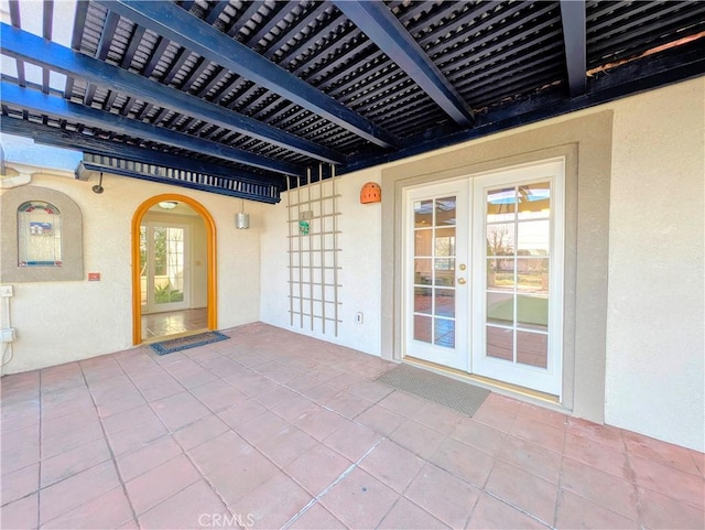 view of patio featuring french doors