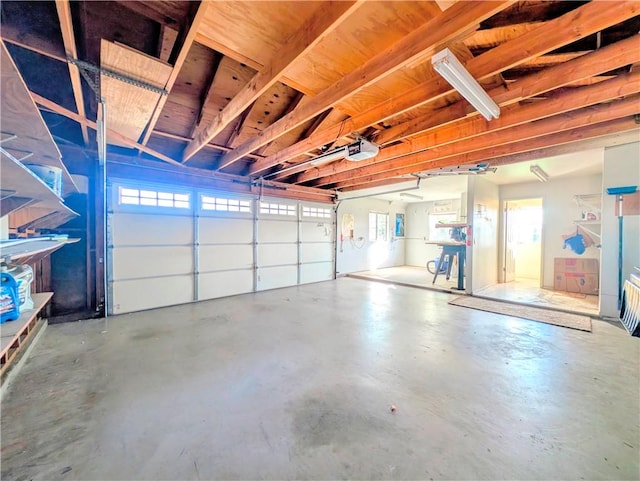 garage featuring a garage door opener