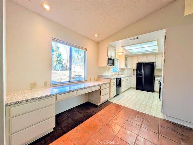 kitchen with lofted ceiling, visible vents, black appliances, and recessed lighting