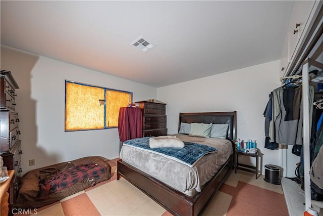 bedroom with visible vents