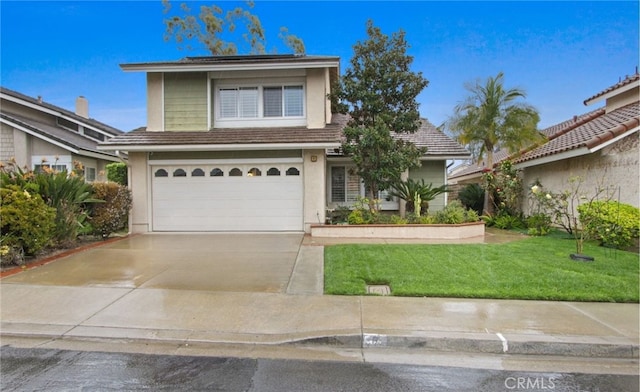 view of front facade with an attached garage, stucco siding, concrete driveway, and a front yard