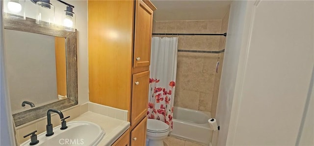 full bathroom featuring shower / bath combo, tile patterned flooring, vanity, and toilet