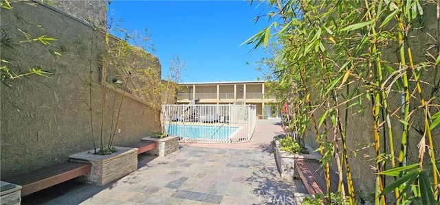 outdoor pool with a patio