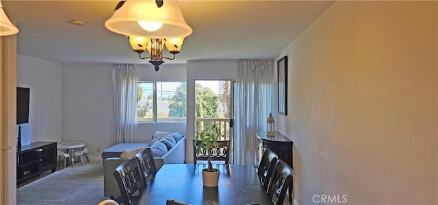 view of carpeted dining space