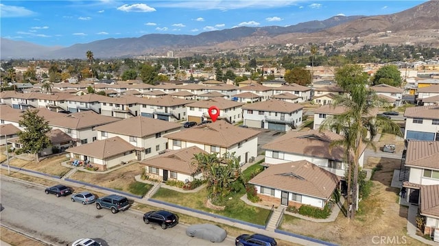 birds eye view of property featuring a residential view and a mountain view