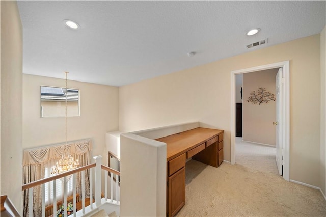 hallway with recessed lighting, baseboards, visible vents, and light colored carpet